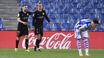 SAN SEBASTIAN, SPAIN - MARCH 21: Antoine Griezmann of FC Barcelona celebrates with Jordi Alba after scoring their side's first goal during the La Liga Santander match between Real Sociedad and FC Barcelona at Estadio Anoeta on March 21, 2021 in San S