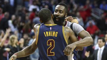 Mar 12, 2017; Houston, TX, USA; Cleveland Cavaliers guard Kyrie Irving (2) and Houston Rockets guard James Harden (13) hug after a game at Toyota Center. Mandatory Credit: Troy Taormina-USA TODAY Sports
