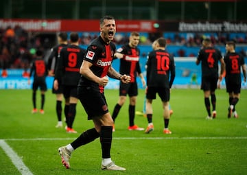 Bayer Leverkusen's Granit Xhaka celebrates after Patrik Schick scores 