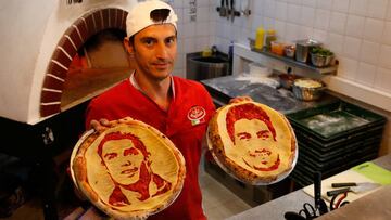 El Olímpico de Fisht de la ciudad de Sochi será mitad rojo, mitad celeste, con un duelo goleador entre Cristiano y Suárez. La imagen de ambos aparece hasta en las pizzas.