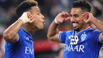 Hilal&#039;s midfielder Matheus Pereira (L) reacts after scoring a goal during the 2021 FIFA Club World Cup football match between UAE&#039;s Al-Jazira and Saudi&#039;s Al-Hilal at Mohammed Bin Zayed stadium in Abu Dhabi on February 6, 2022. (Photo by Giu