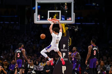 Los Angeles Lakers center Jaxson Hayes (11) dunks against Toronto Raptors guard Davion Mitchell (45)