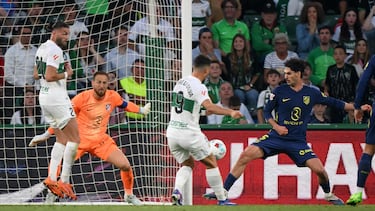 Elche's Portuguese forward #09 Andre Silva scores his team's third goal during the Spanish league football match between Elche CF and Club Atletico Madrid at Martinez Valero Stadium in Elche on April 22, 2026. (Photo by JOSE JORDAN / AFP)