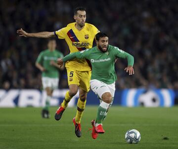 Nabil Fekir y Sergio Busquets.