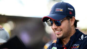 MELBOURNE, AUSTRALIA - MARCH 31: Sergio Perez of Mexico and Oracle Red Bull Racing greets fans on the Melbourne Walk prior to practice ahead of the F1 Grand Prix of Australia at Albert Park Grand Prix Circuit on March 31, 2023 in Melbourne, Australia. (Photo by Clive Mason - Formula 1/Formula 1 via Getty Images)