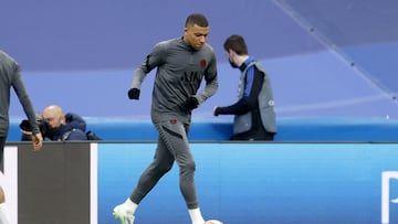 The French forward looked more impressed each time the camera caught his face looking around the Bernabeu as he warmed up ahead of the PSG-Real Madrid game.