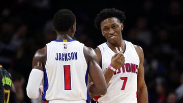 Reggie Jackson y Stanley Johnson