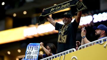 Soccer Football - FIFA Club World Cup - Group D - Chelsea v Los Angeles FC - Mercedes-Benz Stadium, Atlanta, Georgia, U.S. - June 16, 2025 A Los Angeles FC fan holds up a scarf inside the stadium before the match REUTERS/Kai Pfaffenbach