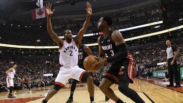 Nov 25, 2018; Toronto, Ontario, CAN; Toronto Raptors forward Kawhi Leonard (2) tries to block Miami Heat guard Dwyane Wade (3) in the first half at Scotiabank Arena. Mandatory Credit: Dan Hamilton-USA TODAY Sports