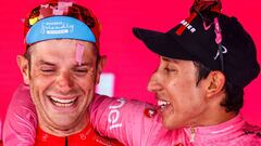 Overall second-placed Team Bahrain rider Italy&#039;s Damiano Caruso (L) and Giro d&#039;Italia 2021 winner Team Ineos rider Colombia&#039;s Egan Bernal celebrate on the podium after the 21st and last stage on May 30, 2021 in Milan. (Photo by Luca Bettini / AFP)