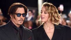 Los actores Johnny Depp y Amber Heard a su llegada a un evento cuando eran pareja.