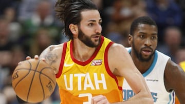 GFX20. SALT LAKE CITY (ESTADOS UNIDOS), 09/02/2018.- El jugador Ricky Rubio (i) de los Utah Jazz en acci&oacute;n frente a Michael Kidd-Gilchrist (d) de los Charlotte Hornets durante un partido de baloncesto de la NBA entre Utah Jazz y Charlotte Hornets que se disputa hoy, viernes 9 de febrero de 2018, en Salt Lake City, Utah (EE.UU.). EFE/GEORGE FREY