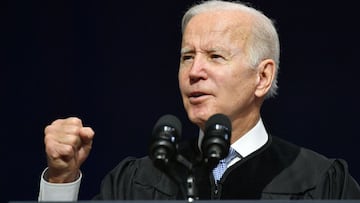 US President Joe Biden addresses graduates of South Carolina State University during their commencement ceremony on December 17, 2021, in Orangeburg, South Carolina. (Photo by MANDEL NGAN / AFP)