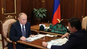 Russian President Vladimir Putin meets with Andrei Vorobyov, the governor of the Moscow region, at the Kremlin in Moscow on July 11, 2022. (Photo by Mikhail KLIMENTYEV / SPUTNIK / AFP) (Photo by MIKHAIL KLIMENTYEV/SPUTNIK/AFP via Getty Images)