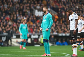 Gerard Pique looking dejected during Barcelona's defeat to Valencia last week.