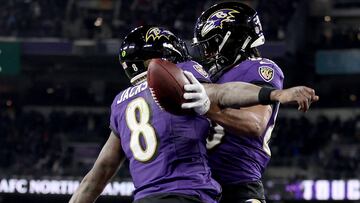 BALTIMORE, MARYLAND - JANUARY 20: Isaiah Likely #80 of the Baltimore Ravens celebrates with Lamar Jackson #8 after scoring a 15 yard touchdown against the Houston Texans during the fourth quarter in the AFC Divisional Playoff game at M&T Bank Stadium on January 20, 2024 in Baltimore, Maryland.   Patrick Smith/Getty Images/AFP (Photo by Patrick Smith / GETTY IMAGES NORTH AMERICA / Getty Images via AFP)