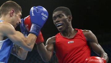 2016 Rio Olympics - Boxing - Quarterfinal - Men's Light Fly (49kg) Quarterfinals Bout 82 - Riocentro - Pavilion 6 - Rio de Janeiro, Brazil - 10/08/2016. Yuberjen Martinez Rivas (COL) of Colombia and Samuel Carmona Heredia (ESP) of Spain compete. REUTERS/Adrees Latif FOR EDITORIAL USE ONLY. NOT FOR SALE FOR MARKETING OR ADVERTISING CAMPAIGNS.