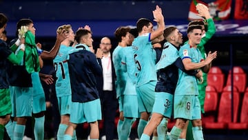 Barcelona's Spanish midfielder #06 Gavi and Barcelona's Spanish midfielder #32 Fermin Lopez react to their at the end of the Spanish Liga football match between CA Osasuna and FC Barcelona at El Sadar stadium in Pamplona on September 3, 2023. (Photo by ANDER GILLENEA / AFP)