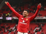 Manchester United's Brazilian midfielder #18 Casemiro waves to fans at the end of the English Premier League football match between Manchester United and Aston Villa at Old Trafford in Manchester, north west England, on March 15, 2026. (Photo by Oli SCARFF / AFP) / RESTRICTED TO EDITORIAL USE. No use with unauthorized audio, video, data, fixture lists, club/league logos or 'live' services. Online in-match use limited to 120 images. An additional 40 images may be used in extra time. No video emulation. Social media in-match use limited to 120 images. An additional 40 images may be used in extra time. No use in betting publications, games or single club/league/player publications. /