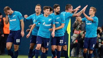 Zenit's players celebrate a goal during the UEFA Europa League round of 32 second leg football match between Zenit Saint-Petersburg and Celtic Glasgow in Saint Petersburg on February 22, 2018. / AFP PHOTO / Yuri KADOBNOV