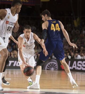 Jaycee Carroll y ante Tomic.