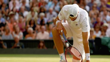 LONDON, ENGLAND - JULY 13: John Isner of The United States reacts during his Men's Singles semi-final match against Kevin Anderson of South Africa on day eleven of the Wimbledon Lawn Tennis Championships at All England Lawn Tennis and Croquet Club o