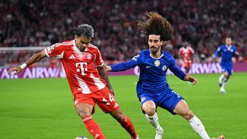 Soccer Football - UEFA Champions League - Bayern Munich v Chelsea - Allianz Arena, Munich, Germany - September 17, 2025 Chelsea's Marc Cucurella in action with Bayern Munich's Luis Diaz REUTERS/Angelika Warmuth