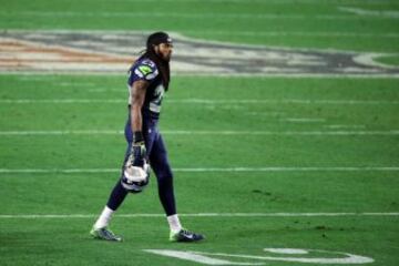 La portada del a?o pasado fue para el pol谷mico cornerback de los Seahawks, Richard Sherman. Tanto Sherman como Seattle completaron una gran temporada, aunque una milagrosa intercepci車n les priv車 de ganar su segunda Super Bowl consecutiva. ?Fue la maldici車n del Madden?