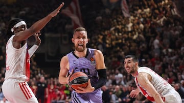 BELGRADE, SERBIA - JANUARY 10: Dzanan Musa (C) of Real Madrid in action against John Holland (L) and Ognjen Dobric (R) of Crvena Zvezda during the 2022-23 Turkish Airlines EuroLeague Regular Season Round 18 game between Crvena Zvezda mts Belgrade and Real Madrid at Aleksandar Nikolic Hall on January 10, 2023 in Belgrade, Serbia. (Photo by Srdjan Stevanovic/Euroleague Basketball via Getty Images)