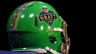 GREEN BAY, WISCONSIN - APRIL 24: A detailed view of helmet is seen during a press conference during the first round of the 2025 NFL Draft at Lambeau Field on April 24, 2025 in Green Bay, Wisconsin. Michael Reaves/Getty Images/AFP (Photo by Michael Reaves / GETTY IMAGES NORTH AMERICA / Getty Images via AFP)