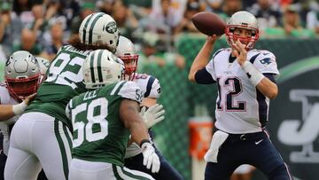 EAST RUTHERFORD, NJ - OCTOBER 15: Quarterback Tom Brady #12 of the New England Patriots looks to pass against the New York Jets during the second quarter of their game at MetLife Stadium on October 15, 2017 in East Rutherford, New Jersey. The New England Patriots won 24-17. Abbie Parr/Getty Images/AFP
== FOR NEWSPAPERS, INTERNET, TELCOS & TELEVISION USE ONLY ==