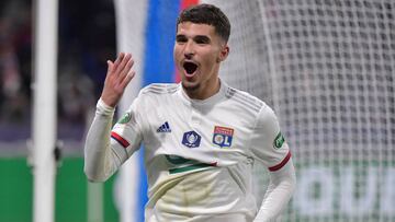 Lyon's French midfielder Houssem Aouar celebrates after scoring the opener during the French Cup quarter-final football match between Olympique Lyonnais and Olympique de Marseille at the Groupama stadium in Decines-Charpieu near Lyon, central eastern