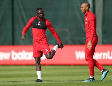 Liverpool's Sadio Mané and Fabinho in training yesterday.