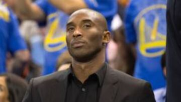 Bryant, con gesto serio.