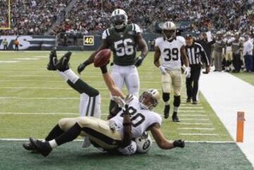 New Orleans Saints-New York Jets. Jimmy Graham con el balón.