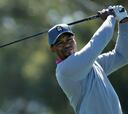 Tiger Woods se despide del
torneo y Justin Rose sigue líder
