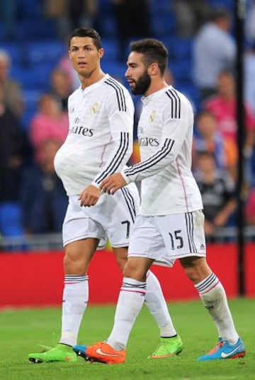 Cristiano Ronaldo with Carvajal and another ball that was blasted in three times against Athletic Bilbao on October 5, 2014.