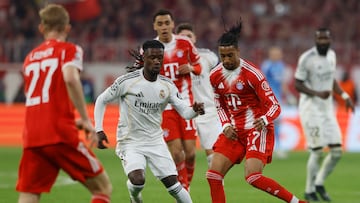 Soccer Football - UEFA Champions League - Quarter Final - Second Leg - Bayern Munich v Real Madrid - Allianz Arena, Munich, Germany - April 15, 2026 Bayern Munich's Michael Olise in action with Real Madrid's Eduardo Camavinga REUTERS/Michaela Stache