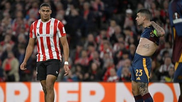 Roma's Italian defender #23 Gianluca Mancini shows his tattoos to Athletic Bilbao's Spanish forward #21 Maroan Sannadi during the UEFA Europa League last 16 second leg football match between Athletic Club Bilbao and AS Roma at the San Mames stadium in Bilbao, on March 13, 2025. (Photo by ANDER GILLENEA / AFP)