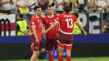 Frankfurt Am Main (Germany), 23/06/2024.- Granit Xhaka of Switzerland (C) reacts with teammates after the UEFA EURO 2024 group A soccer match between Switzerland and Germany, in Frankfurt am Main, Germany, 23 June 2024. (Alemania, Suiza) EFE/EPA/FRIEDEMANN VOGEL
