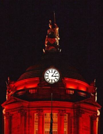 Liverpool Town Hall lit up by red light in rememberance of the 96.