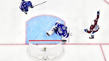 TAMPA, FLORIDA - JUNE 20: Gabriel Landeskog #92 of the Colorado Avalanche scores a goal agaisnt Andrei Vasilevskiy #88 of the Tampa Bay Lightning during the second period in Game Three of the 2022 NHL Stanley Cup Final at Amalie Arena on June 20, 2022 in Tampa, Florida. Tampa Bay defeated Colorado 6-2.   Julio Aguilar/Getty Images/AFP
== FOR NEWSPAPERS, INTERNET, TELCOS & TELEVISION USE ONLY ==