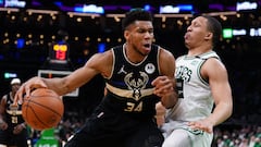 May 11, 2022; Boston, Massachusetts, USA; Milwaukee Bucks forward Giannis Antetokounmpo (34) fouls Boston Celtics forward Grant Williams (12) in the second half during game five of the second round for the 2022 NBA playoffs at TD Garden. Mandatory Credit: David Butler II-USA TODAY Sports