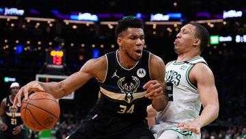 May 11, 2022; Boston, Massachusetts, USA; Milwaukee Bucks forward Giannis Antetokounmpo (34) fouls Boston Celtics forward Grant Williams (12) in the second half during game five of the second round for the 2022 NBA playoffs at TD Garden. Mandatory Credit: David Butler II-USA TODAY Sports