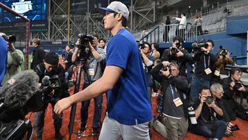 Los Angeles Dodgers' Shohei Ohtani takes the field for a baseball workout at Gocheok Sky Dome in Seoul on March 16, 2024, ahead of the 2024 MLB Seoul Series baseball game between Los Angeles Dodgers and San Diego Padres. (Photo by Jung Yeon-je / AFP)