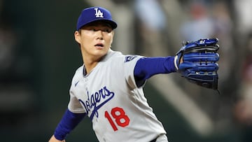 Apr 18, 2025; Arlington, Texas, USA; Los Angeles Dodgers pitcher Yoshinobu Yamamoto (18) throws a pitch during the seventh inning against the Texas Rangers at Globe Life Field. Mandatory Credit: Tim Heitman-Imagn Images