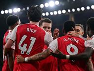 Arsenal's Brazilian striker #09 Gabriel Jesus (C) celebrates with teammates after his pressure on Wolverhampton Wanderers' Colombian defender #15 Yerson Mosquera forces him to score an own-goal, Arsenal's second goal during the English Premier League football match between Arsenal and Wolverhampton Wanderers at the Emirates Stadium in London on December 13, 2025. (Photo by Ben STANSALL / AFP) / RESTRICTED TO EDITORIAL USE. No use with unauthorized audio, video, data, fixture lists, club/league logos or 'live' services. Online in-match use limited to 120 images. An additional 40 images may be used in extra time. No video emulation. Social media in-match use limited to 120 images. An additional 40 images may be used in extra time. No use in betting publications, games or single club/league/player publications. /