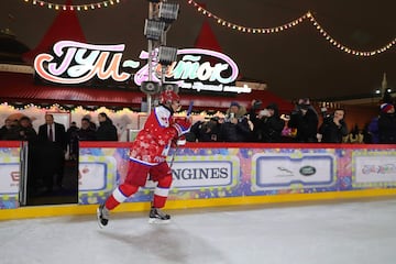 Vladimir Putin took part in the traditional Christmas day ice hockey exhibition match in Red Square and led his side to victory, scoring eight times in an 8-5 victory, according to the Associated Press and Reuters, although the Kremlin match report credit