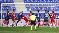 HUESCA, SPAIN - FEBRUARY 21: Jorge Pulido of SD Huesca scores his team's second goal during the La Liga Santander match between SD Huesca and Granada CF at Estadio El Alcoraz on February 21, 2021 in Huesca, Spain. Sporting stadiums around Spain remain und