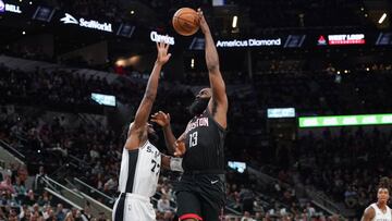 Dec 3, 2019; San Antonio, TX, USA; Houston Rockets guard James Harden (13) shoots over San Antonio Spurs forward DeMarre Carroll (77) in the second half at the AT&T Center. Mandatory Credit: Daniel Dunn-USA TODAY Sports
